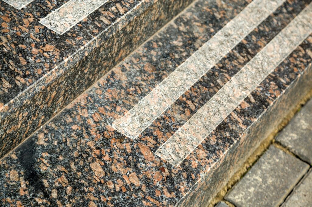 Detail of a house facade. New granite stairs.