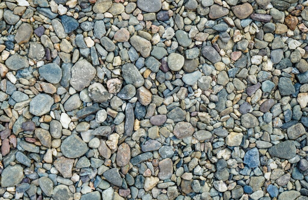 Pebbles stone or river stone background with vintage filter